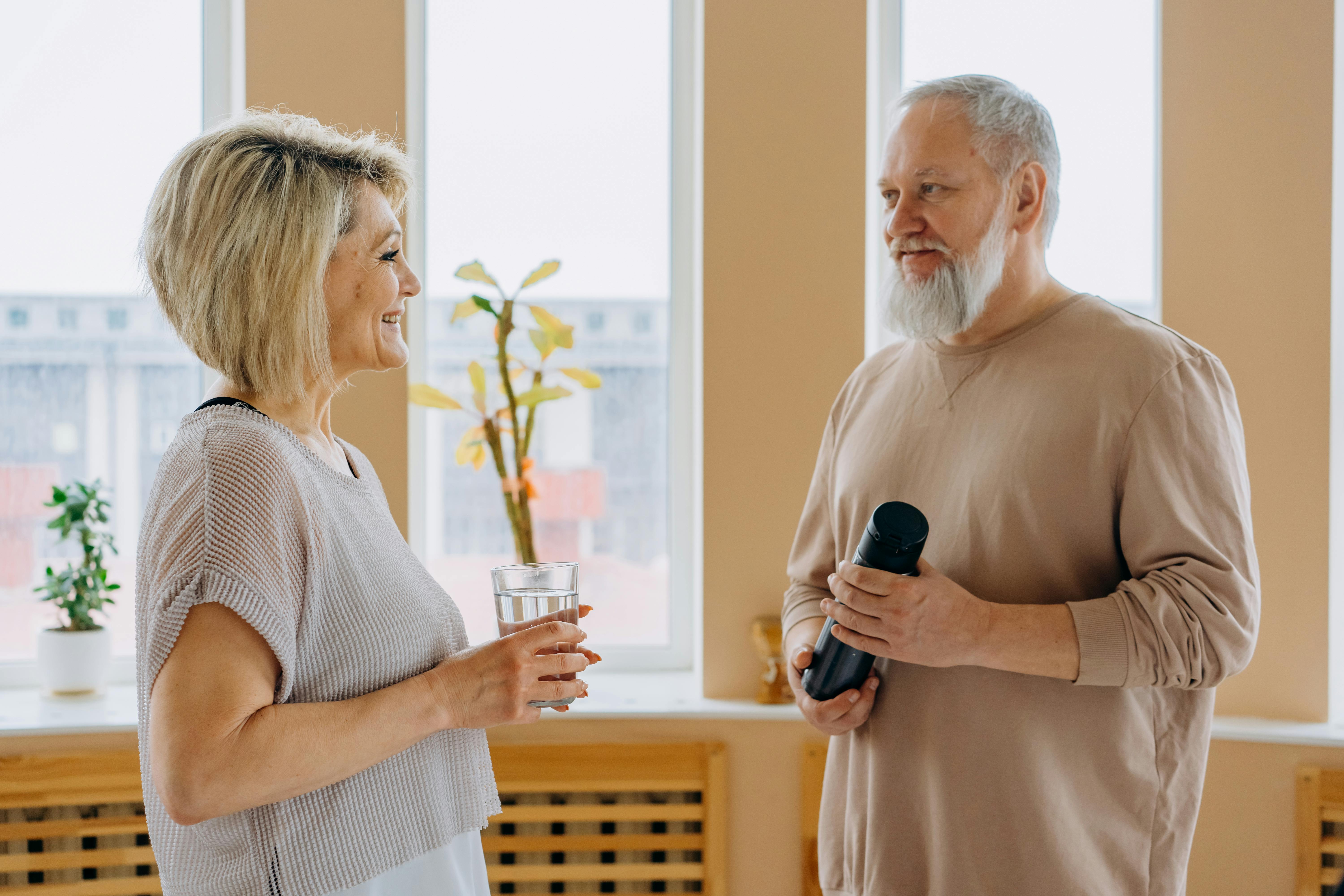 A happy man and woman talking and bonding | Source: Pexels