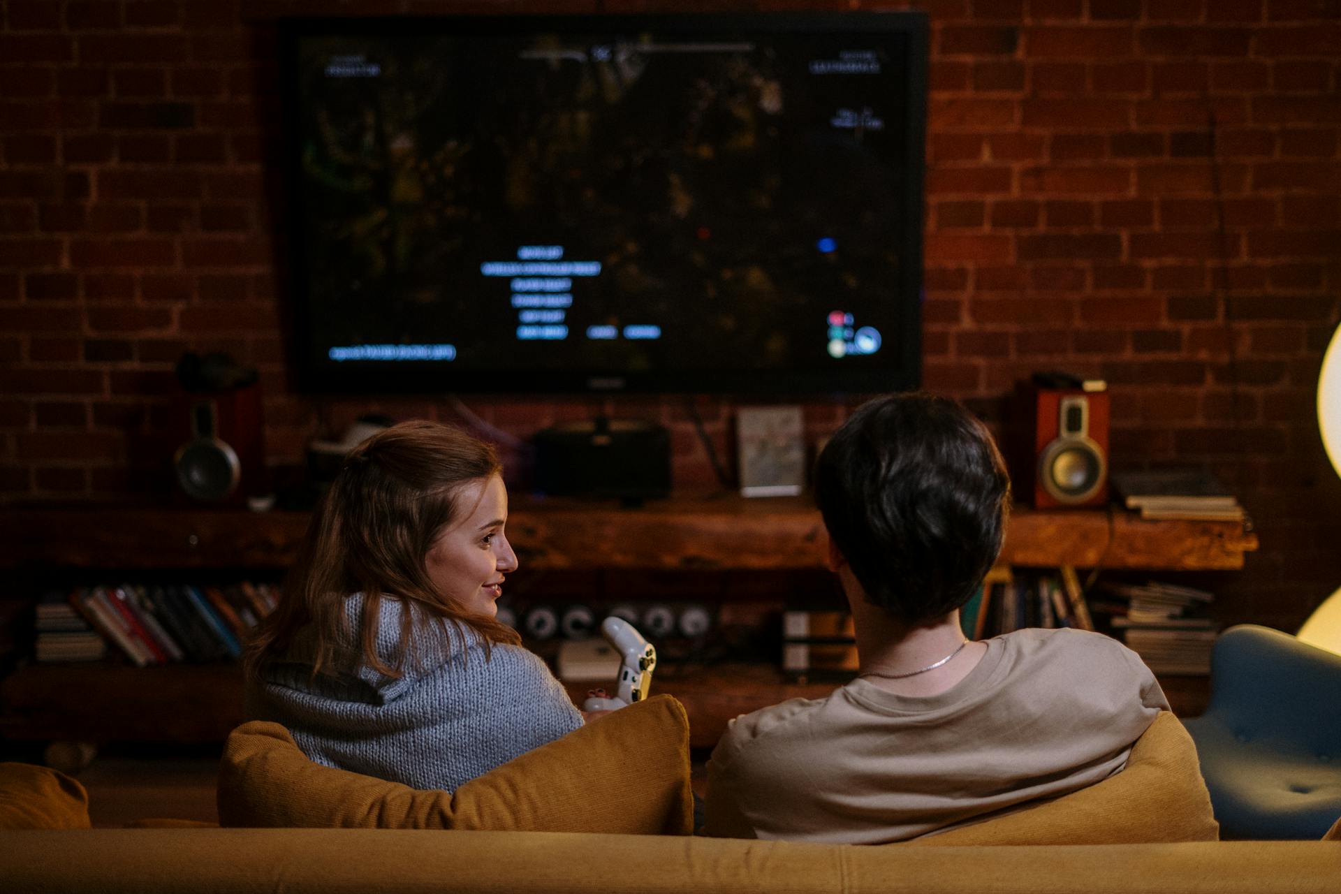 A couple sitting on their sofa | Source: Pexels