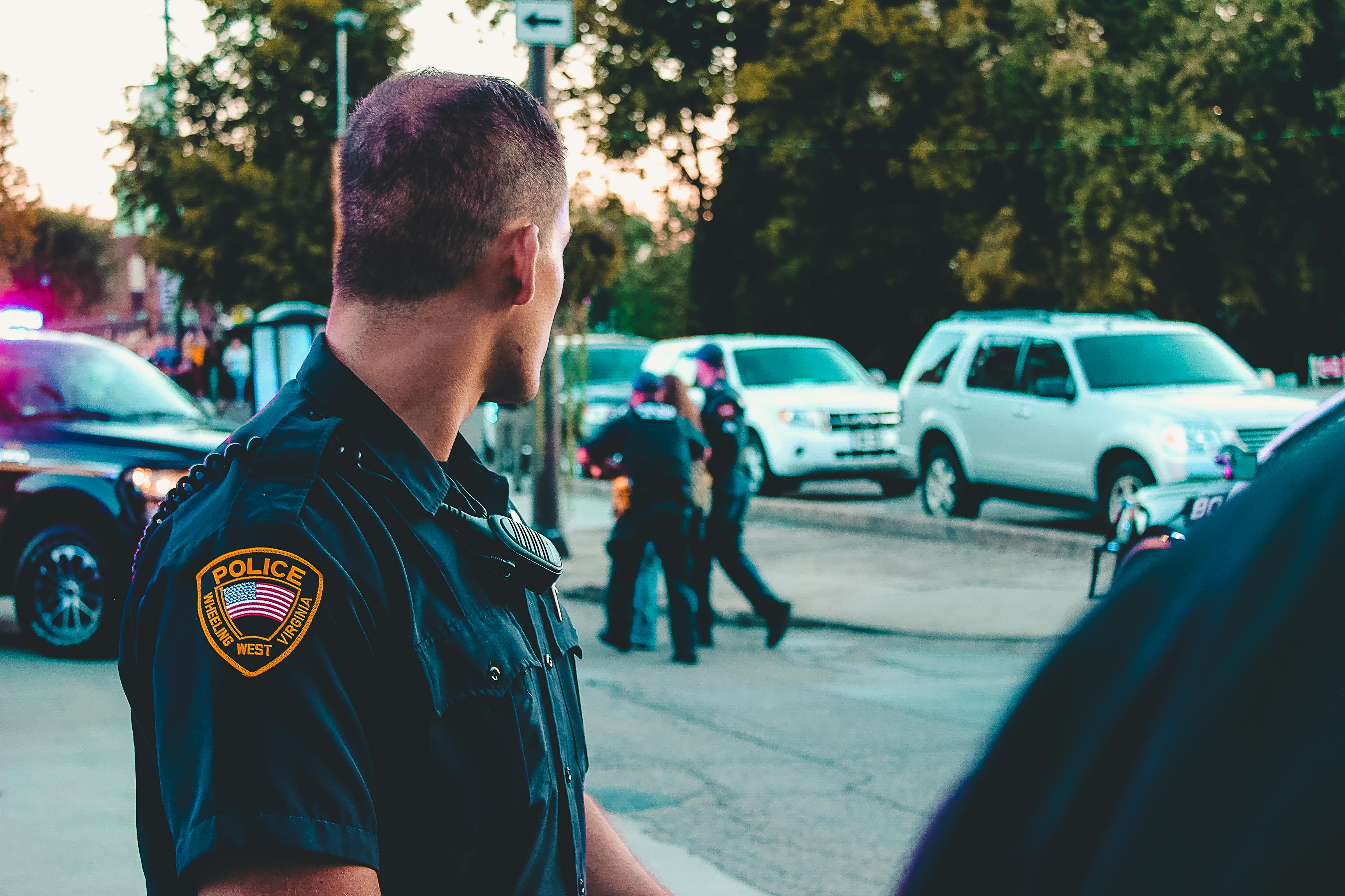 Police taking a man away | Source: Pexels