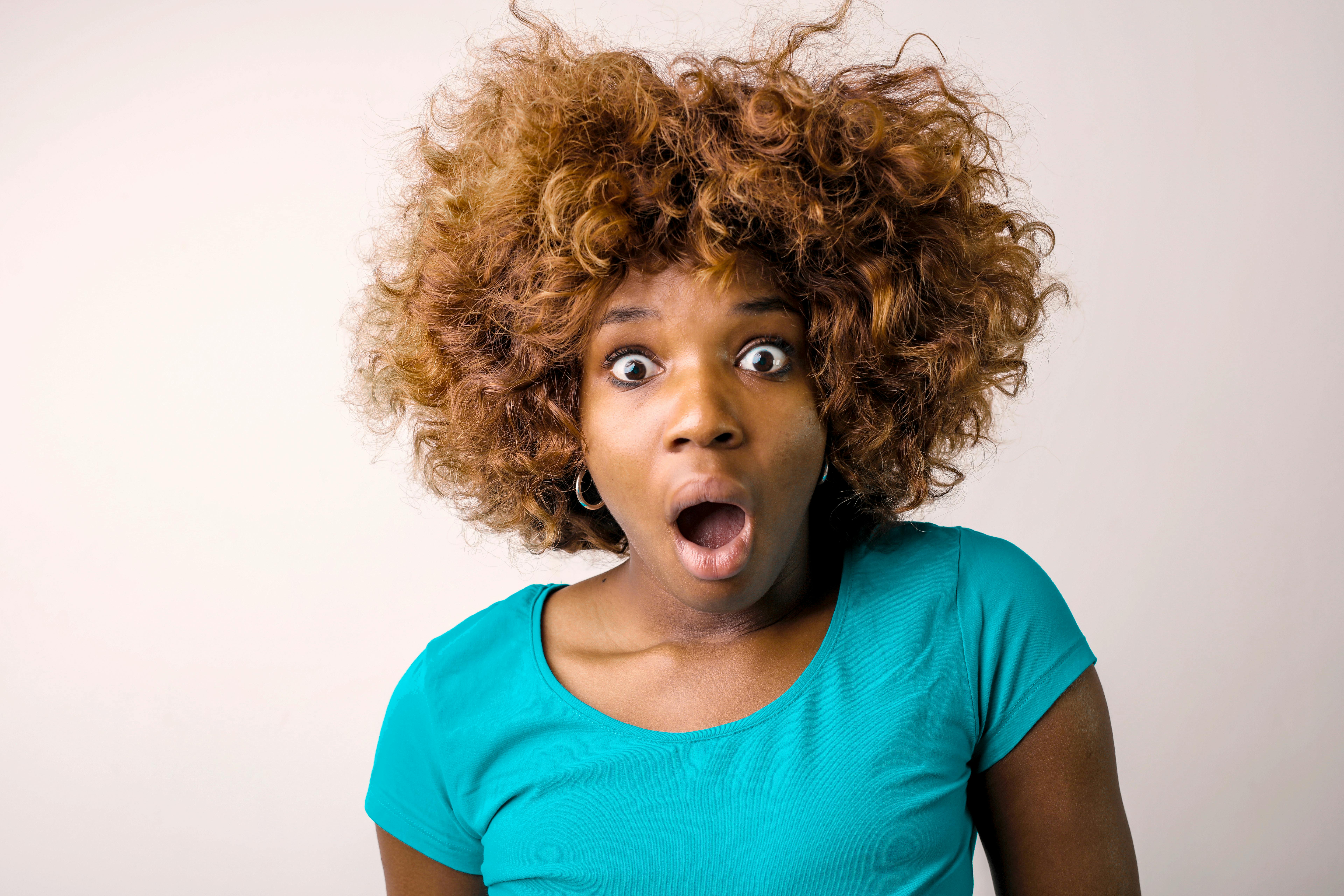 A woman reacting in shock | Source: Pexels