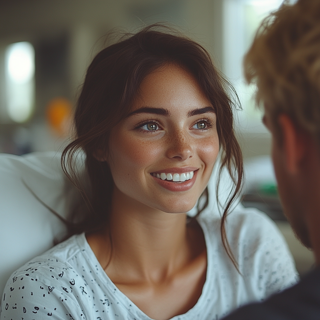 A woman in hospital bed talking to her boyfriend | Source: Midjourney